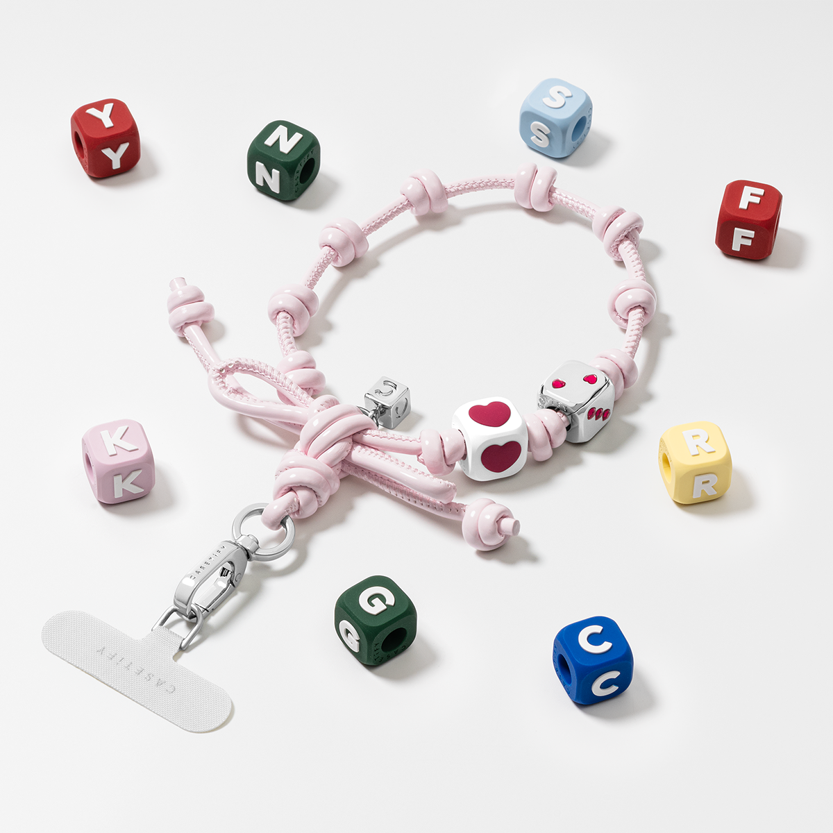 CASETiFY Bow Charm Wristlet