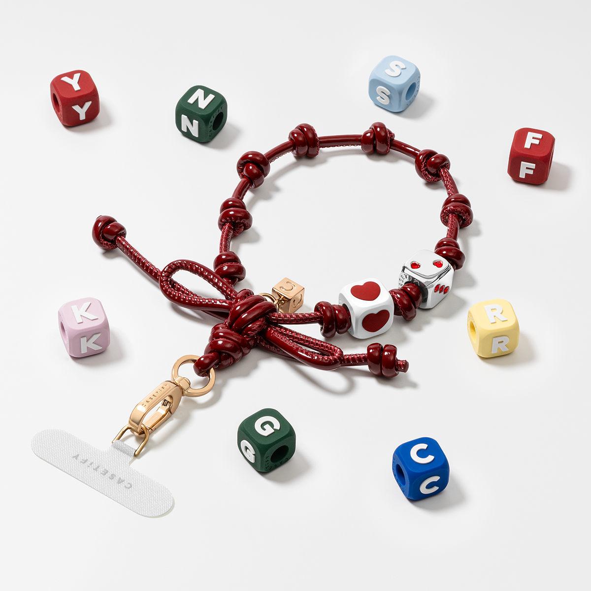 CASETiFY Bow Charm Wristlet