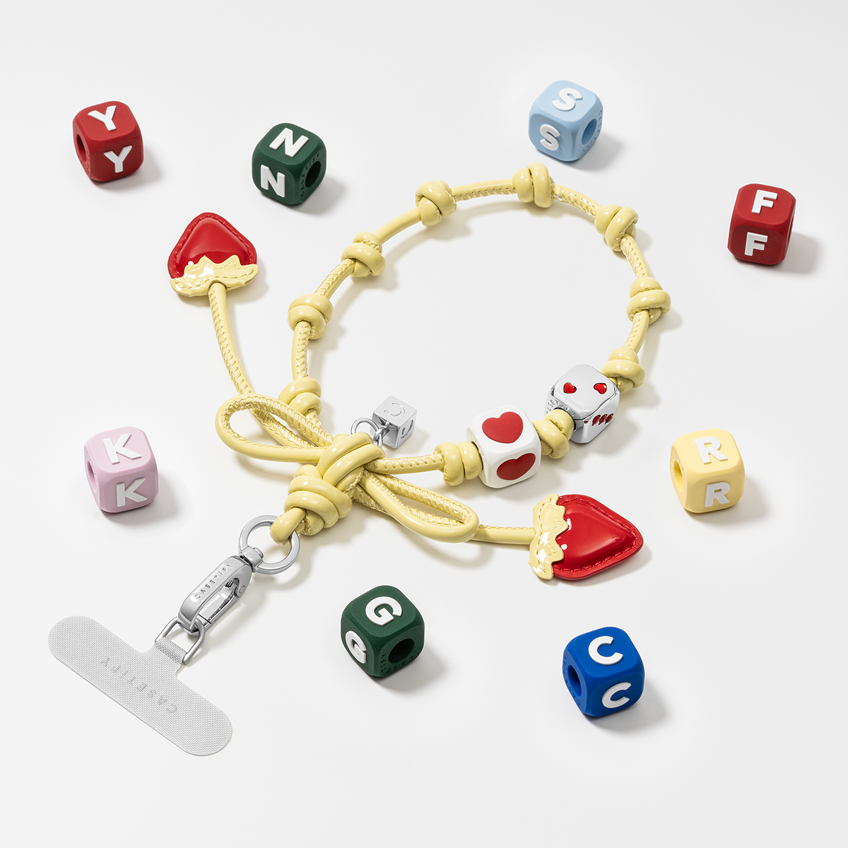CASETiFY Bow Charm Wristlet
