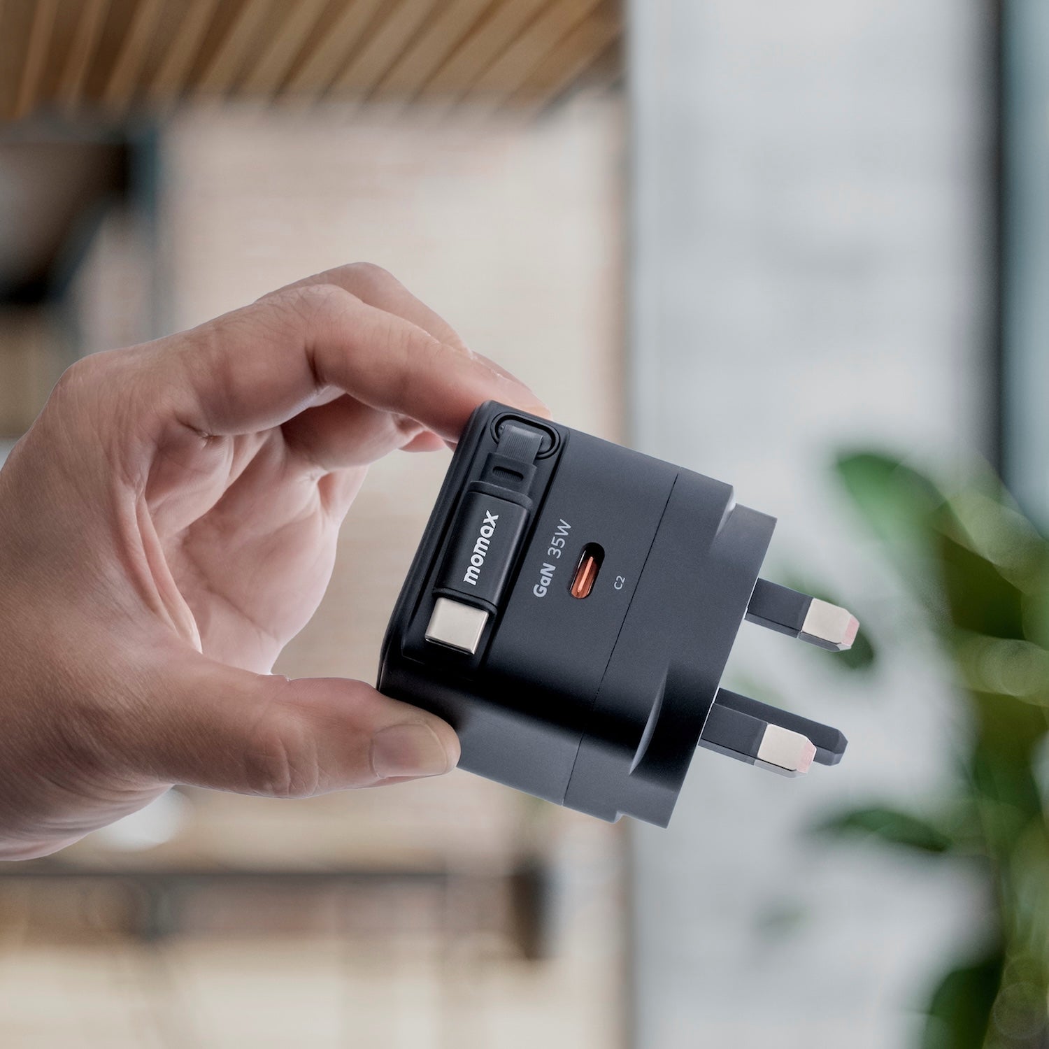 Momax UM76 Compact 65W GaN Charger with Built-in USB-C Cable for Laptop & Mobile Devices